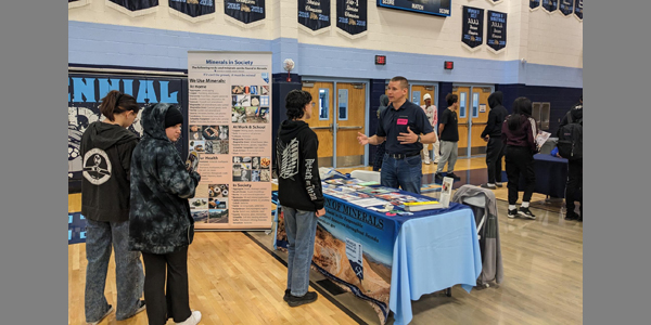 Garrett Wake with the Nevada Division of Minerals speaks to students about careers in the minerals and energy industries in Nevada at the Centennial High School career fair, March 29, 2023.
